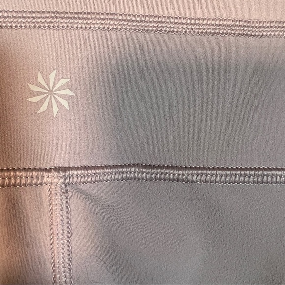 ATHLETA Leggings. Gray. Inside key pocket, 2 hip pockets. Seamed details. XS - Picture 6 of 8